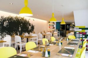Bright-Modern-Restaurant-Interior-Design-with-Yellow-Chandeliers-by-Lifeforms-Studio-505x336